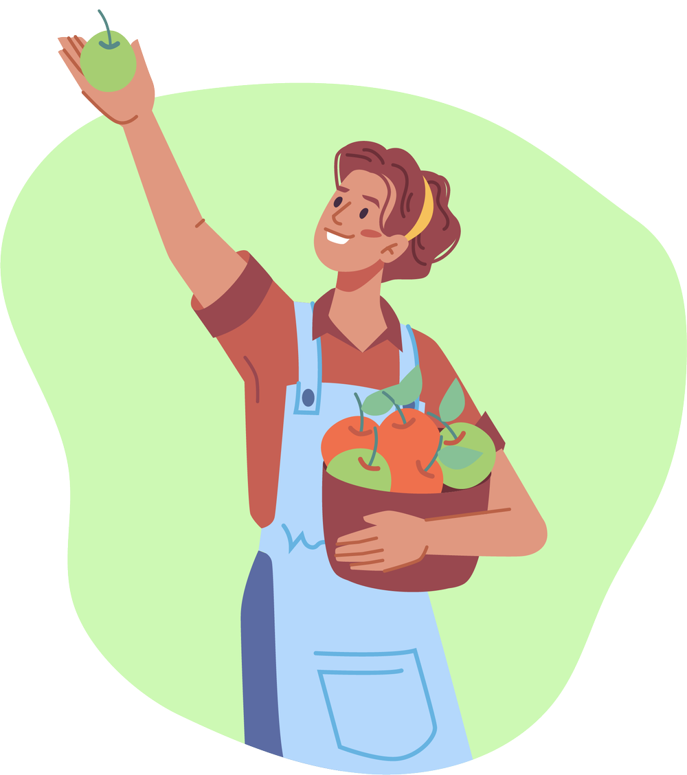 Smiling female farmer holding up a freshly picked apple